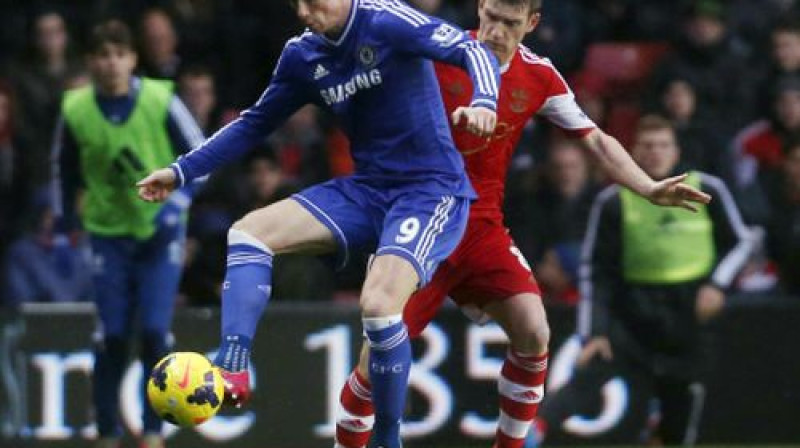 Fernando Toress un Stīvens Deiviss 
Foto: AP/Scanpix