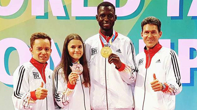 Treneris Boriss Vinklers (Vācija), Inese Tarvida (Latvija), Abduls Razaks Isufu (Nigēra), galvenais treneris Markuss Kolefels (Vācija) 
Foto: TCC Friedrichshafen