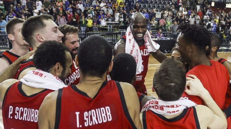 Kanāda līksmo par iegūto ceļazīmi uz Pasaules kausu. Foto: FIBA