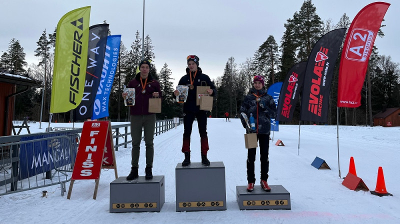 Godalgotais trijnieks 15km distancē. Foto: Fischer Slēpošanas centrs.