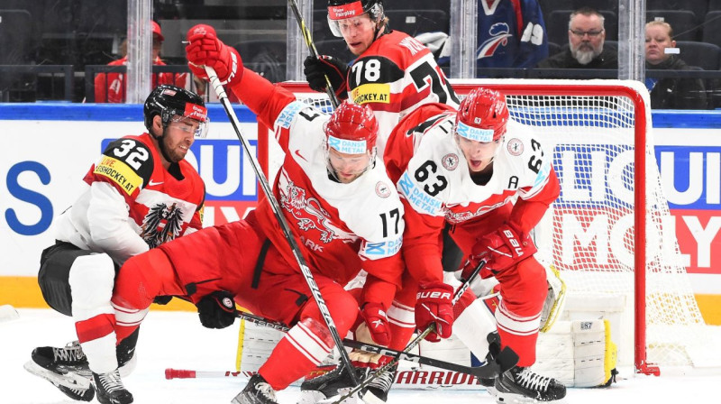 Cīņa Austrijas valstsvienības vārtu priekšā. Foto: IIHF