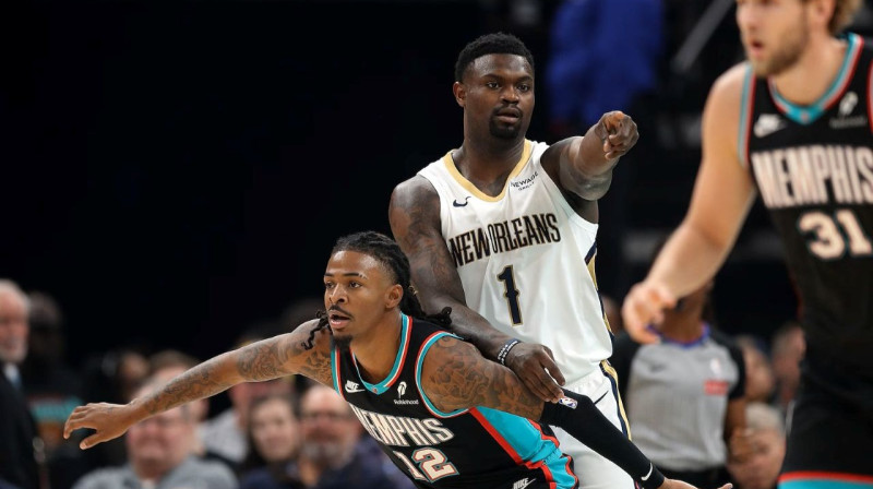 Zaions Viljamsons un Dža Morents. foto: NBA.com