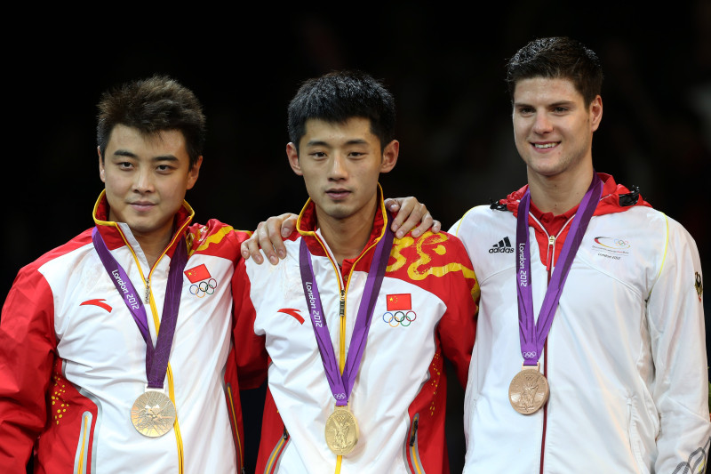 Galda tenisā vīriem zelts un sudrabs Ķīnai, bronza - Vācijai